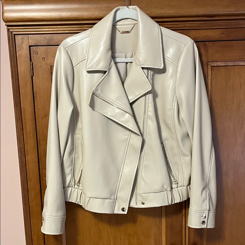 Chico’s faux leather Jacket . NWOT. Lined with gold hardware. Gorgeous Jacket